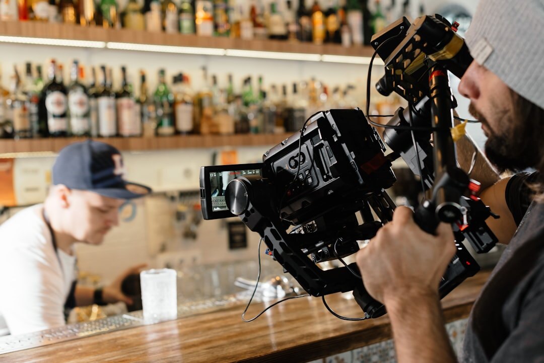 Professional video interview setup with two people and camera equipment